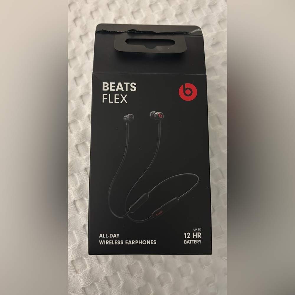 BEATS FLEX black- like new with box and extra ear buds.